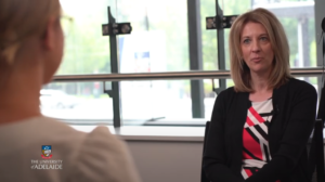Modern Monetary Theory: A picture of Stephanie Kelton being interviewed by an economics student at the University of Adelaide