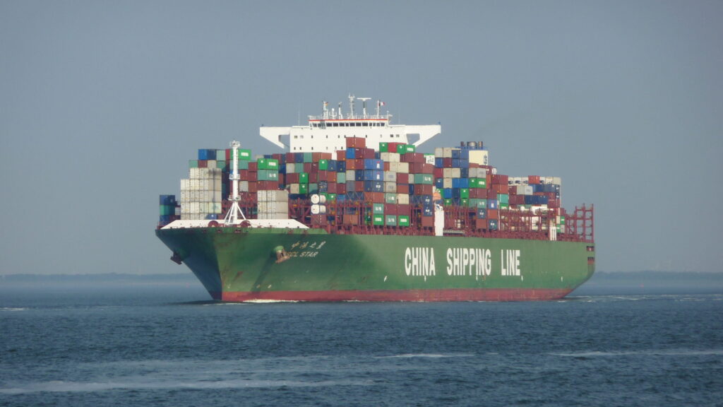 Cost of shipping: image shows a fully laden ship of China Shipping Line
