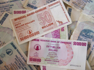 Causes of hyperinflation: Picture shows some 50 billion dollar Zimbabwean bank notes